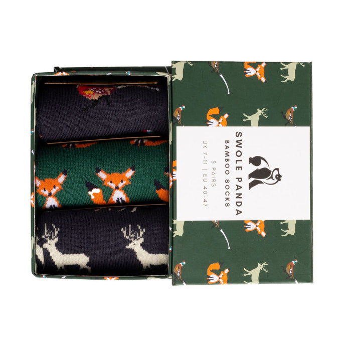 Set of patterned socks in a Swole Panda branded box on a white background