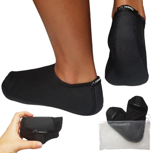 Black neoprene beach socks with packaging on a white background
