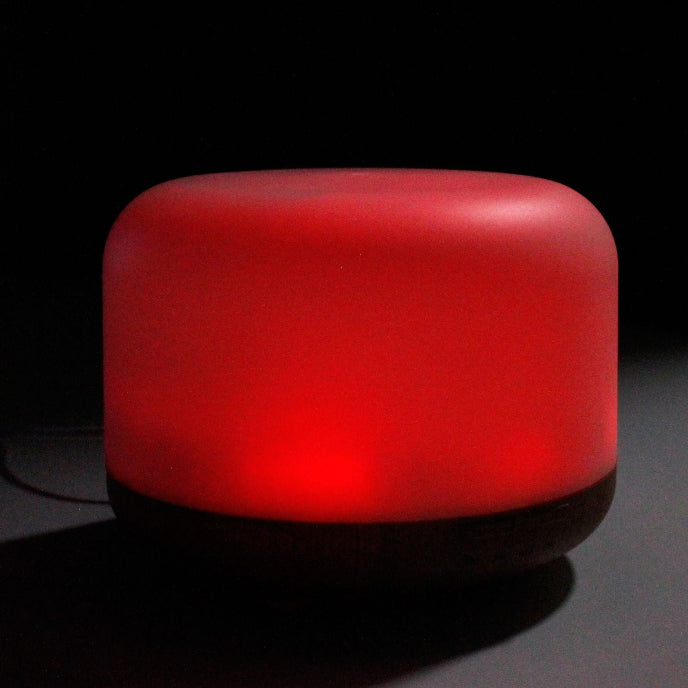 Red cylindrical light on a dark background