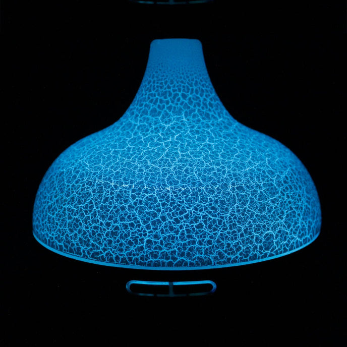 Blue textured object on a black background